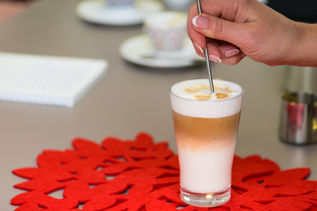preparing latte macchiatoの写真素材