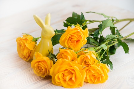 Easter rabbit with fresh flowersの写真素材