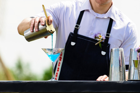 bartender workplace. bartender on the street catering bar preparの写真素材