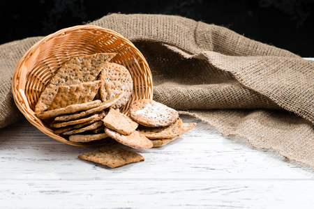 basket with sweet homemade classical Italian crackers on light wの写真素材