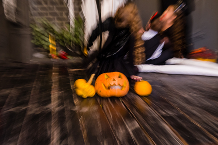 Halloween pumpkin head jack lantern on dark wooden background, bの写真素材
