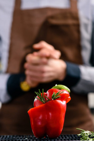 Bell-pepper cocktail served in a bell-pepper rosemary
