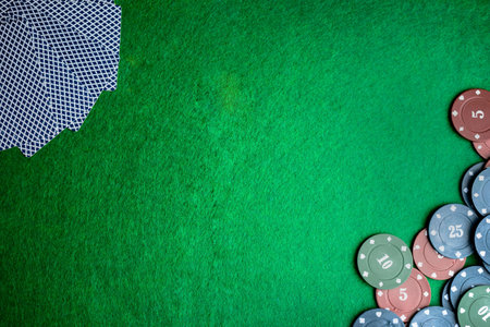 Concept of casino, playing cards and money. Stacks of poker chipの写真素材