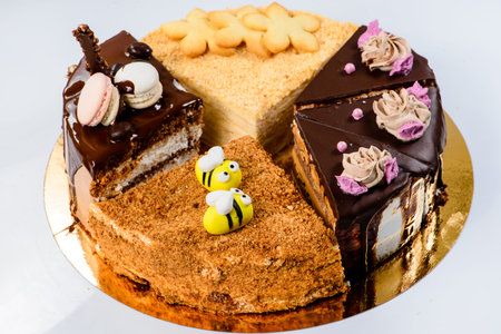 various pieces of cake on a plate, shallow DOF