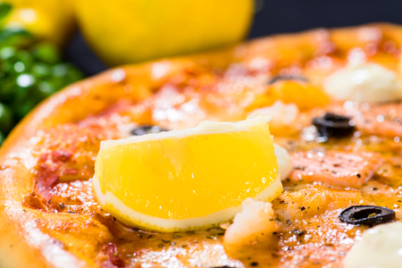 Delicious Sea Food background with lemon, shrimpsの写真素材