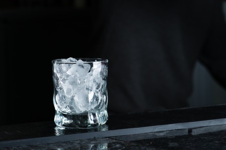 ice for cocktails closeup, bartender at workの写真素材