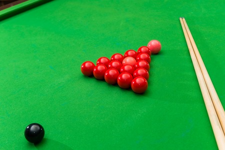 Game snooker billiards, athlete kick cue close up, selective focusの写真素材