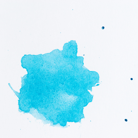 Azure blue paint splatter. Paint splash on white background. Watercolor texture, effect templateの写真素材