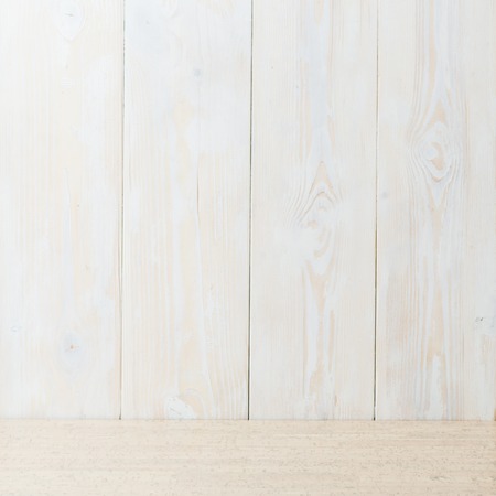 wooden table and dark wooden wall copy spaceの写真素材