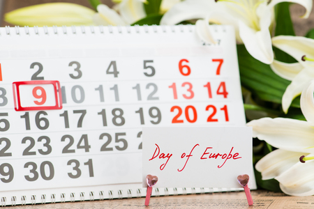 Image of may 9 calendar on floral background with flowers, empty space for text. Day of Europeの写真素材