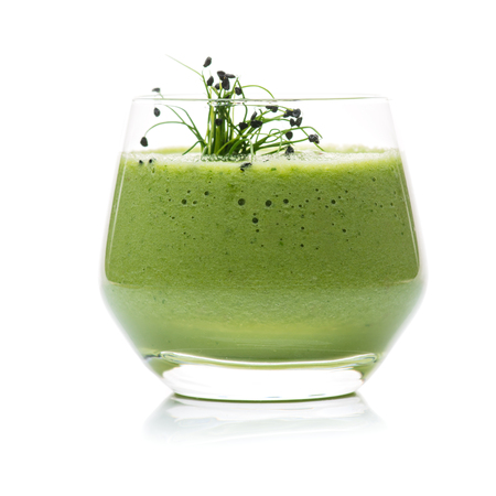 Fruit cocktail vegetarian isolated on white in a glassの写真素材