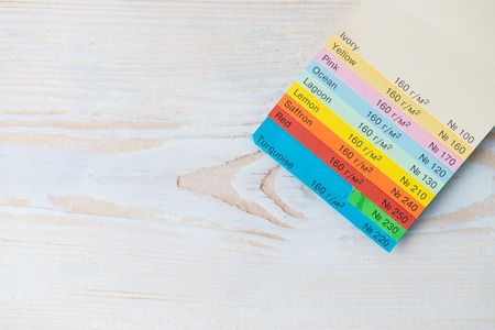Color card. Color guide closeup On a wooden background mock up, Copy spaceの写真素材