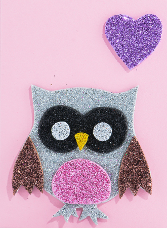 pink greeting pattern decorated with grey owl and purple heartの写真素材