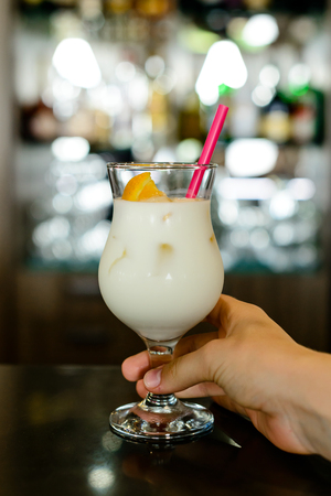 milkshake with orange in the barの写真素材