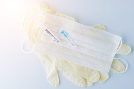 Medicine background syringe, bandage and gloves