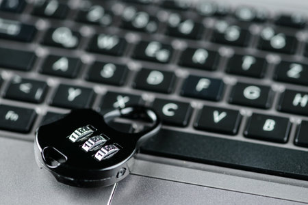 Metal lock on the computer keyboard. Computer security concept