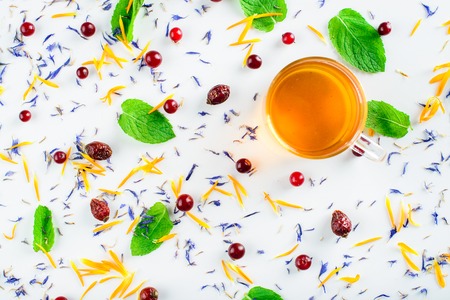 Herbal tea with chamomile and mint Flat lay styleの写真素材