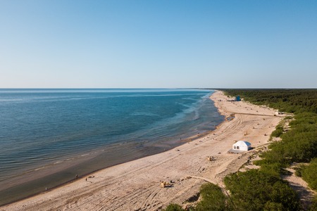 Aerial view of coast in Lithuania Baltic cold sea on a hot sunny day beachの写真素材