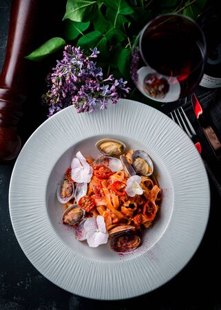 yummy italian pasta with seafood, Italian pasta with seafood top view, flat layの写真素材