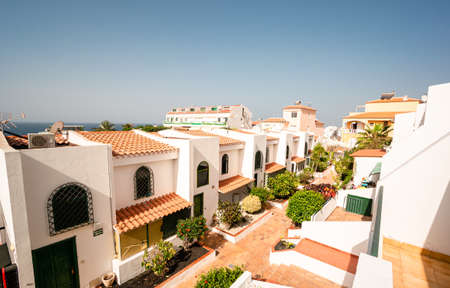 Elevaterd view of apartments and townhouses in the town centre, Spanish town house middle-class housingの写真素材