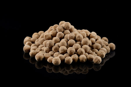 Boiled Tapioca Pearls on black background. For Bubble tea concepts tapioca balls - a new trend in...