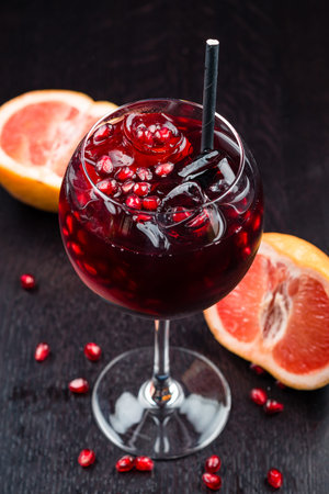 Cold sangria drink Grapefruit and pomegranate cocktail