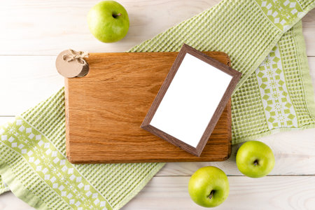 empty wooden board and apples copy space layout, template for food background, copy space and cutting board for your text top view, flat layの写真素材