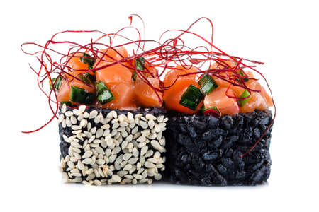 two maki sushi on a white background, Uramaki maki sushi, two rolls isolated on whiteの写真素材