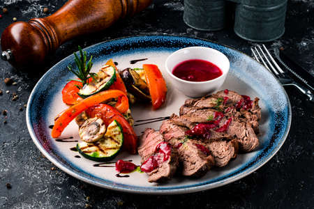 Delicious juicy beef steak with grill vegetables. rib eye steak with grilled vegetablesの写真素材