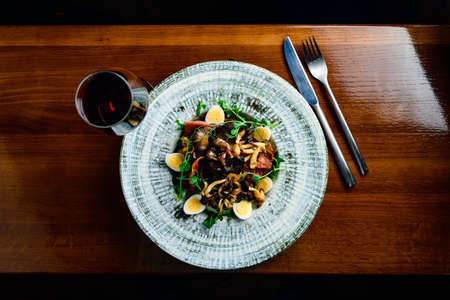 Spicy salad with mushrooms and microgreens. Vegan dish.の写真素材