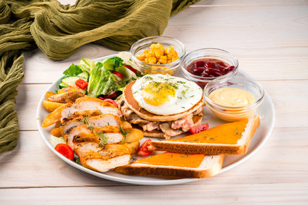 large english breakfast pancakes, sandwiches, salad, breast and egg, Full fry up American breakfast....