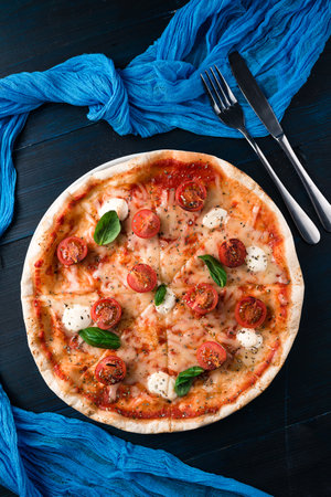 Pizza Margherita on dark backgroundの写真素材