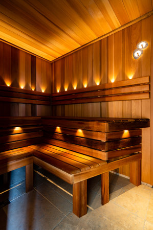 The Red Canadian Cedar Finnish Sauna interior with lightsの写真素材