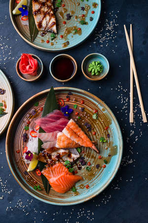 Sashimi set, Japanese food sashimi a traditional dish of raw fish served on the table with copy spaceの写真素材