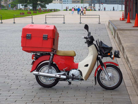 Yokohama Kanagawa/Japan-Jul03,2019:Japanese postal red color motorcycleのeditorial素材