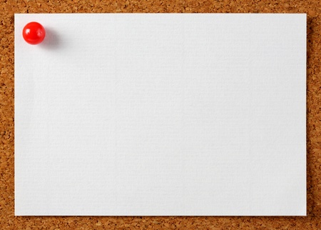 Note memo paper with red pin on cork boardの写真素材