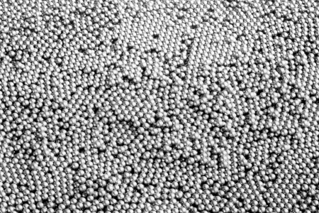 Small stainless steel ball on white backgroundの写真素材