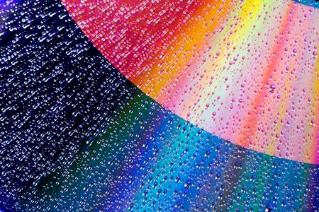 Close up water droplet on colorful backgroundの写真素材