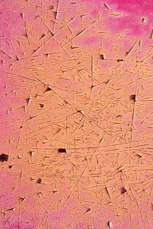 Close up grunge red color cracked paint texture backgroundの写真素材