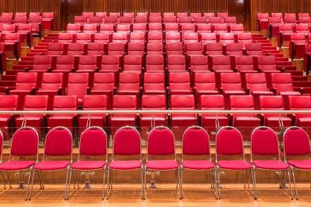 Red color theatre chair in conference room の写真素材