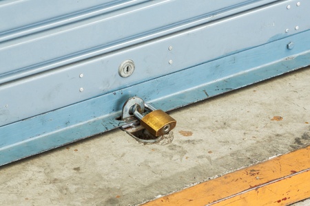 Close up shutter door with key locked of car garageの写真素材