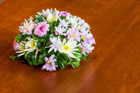 Close up flower bouquet on wood tableの写真素材