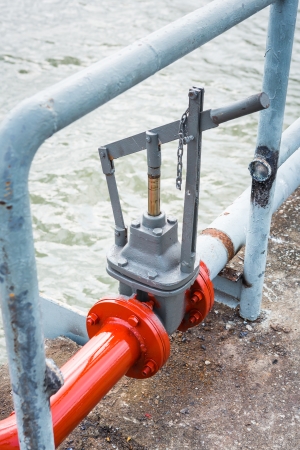 Close up sea water valve by the seaの写真素材