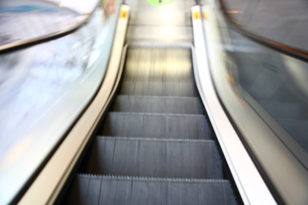  Blurred moving escalator shot by slow shutter speedの写真素材