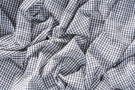 Close up wrinkled old and dirty checkerboard pattern cloth textureの写真素材