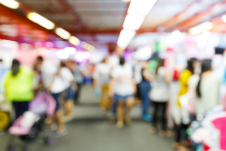 Abstract blurred people walking in shopping centerの写真素材