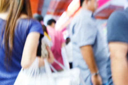 Abstract blurred people walking in shopping center