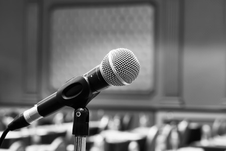 Close up old microphone in conference roomの写真素材
