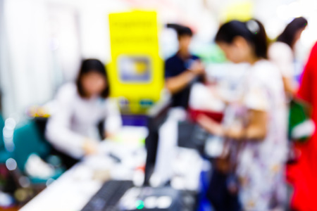 Abstract blurred people walking in shopping centreの写真素材
