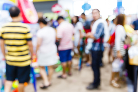 Abstract blurred people walking in shopping centreの写真素材